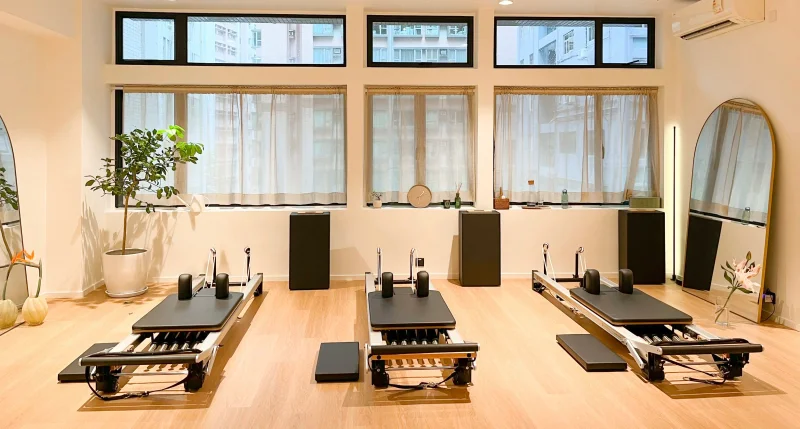 Pilates Studio Sheung Wan Interior - Bright natural light reformer Pilates room in Hong Kong